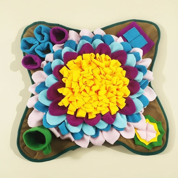 Tapis de fouille CloudSleep — tapis d'activité en feutre multicolore avec une fleur jaune au centre et des poches à friandises.