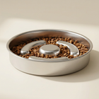 Low side view of the stainless-steel slow feeder with kibble.