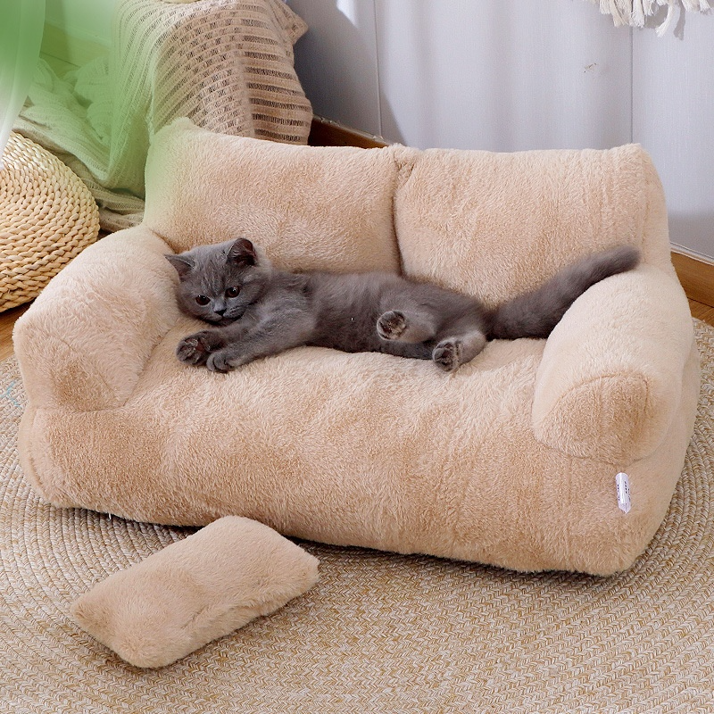 Grey cat lying on the CloudSleep plush sofa bed
